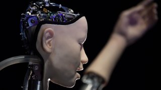 An AI robot with a humanistic face, entitled Alter 3: Offloaded Agency, at the Barbican Centre in London on May 15, 2019.