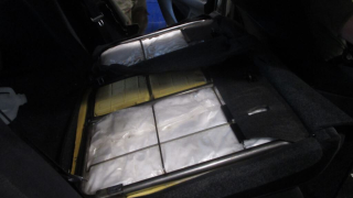 Forty-one packages were discovered within the floor and seats of the vehicle, weighing 242.64 pounds.