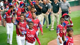 The Cuba Region champion Little League team from Bayamo, Cuba, participates in the opening ceremony of the 2023 Little League World Series tournament in South Williamsport, Pa., Wednesday, Aug. 16, 2023.