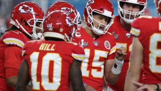 Patrick Mahomes #15 of the Kansas City Chiefs huddles with his team against the San Francisco 49ers during the third quarter in Super Bowl LIV at Hard Rock Stadium on February 02, 2020 in Miami, Florida.