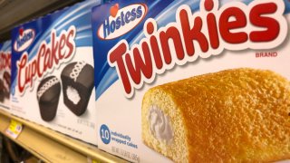 Hostess Twinkies and CupCakes are displayed on a store shelf on May 17, 2021 in San Anselmo, California.