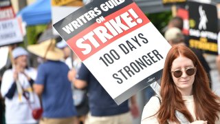 Members of the Writers Guild of America (WGA) and the Screen Actors Guild walk the picket line outside of Fox Studios in Los Angeles, California, on August 9, 2023. Film and TV production ground to a halt 100 days ago when writers downed their pens, only to be joined on the picket lines in mid-July by actors.