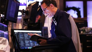 Traders work on the floor of the New York Stock Exchange during morning trading on August 31, 2023 in New York City.