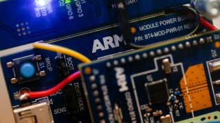 Components manufactured by Arm sit inside a demonstration ARMmbed parking meter on display on the second day of Mobile World Congress in Barcelona, Feb. 28, 2017.
