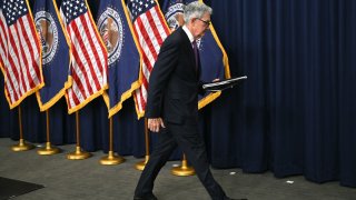 US Federal Reserve Chairman Jerome Powell departs after speaking during a press conference in Washington, DC, on September 20, 2023.