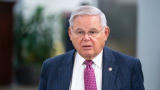 Sen. Bob Menendez, D-N.J., walks through the Senate subway on his way to a vote in the Capitol, in Washington, D.C., May 4, 2023.