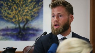 FILE - Owen Shroyer, an InfoWars host and sometimes reporter who is a frequent guest on the Alex Jones Show, testifies during Jones' defamation damages trial at the Travis County Courthouse, July 29, 2022, in Austin, Texas. Infowars host Owen Shroyer, who promoted baseless claims of 2020 election fraud on the far-right internet platform, pleaded guilty on Friday, June 23, 2023, to joining the mob of Donald Trump supporters who rioted at the U.S. Capitol.