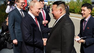 Russian President Vladimir Putin, left, and North Korea’s leader Kim Jong Un shake hands during their meeting at the Vostochny cosmodrome outside the city of Tsiolkovsky, about 200 kilometers (125 miles) from the city of Blagoveshchensk in the far eastern Amur region, Russia, on Wednesday, Sept. 13, 2023.