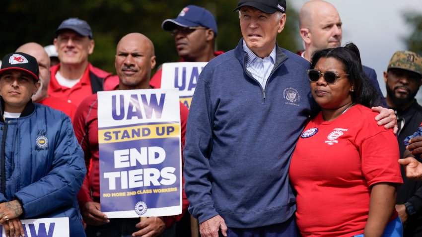 President Joe Biden joins striking United Auto Workers on the picket line, Tuesday, Sept. 26, 2023, in Van Buren Township, Mich. (AP Photo/Evan Vucci)