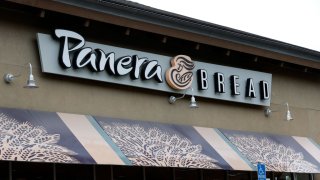 A sign is posted on the exterior of a Panera Bread restaurant on November 09, 2021 in San Rafael, California.