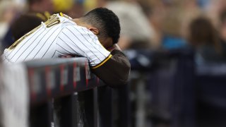 SAN DIEGO, CALIFORNIA – AUGUST 31: Manny Machado #13 reacts to Fernando Tatis Jr. #23 of the San Diego Padres flying out during the fourth inning of a game against the San Francisco Giants at PETCO Park on August 31, 2023 in San Diego, California. (Photo by Sean M. Haffey/Getty Images)