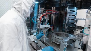 Employees working in Precision’s manufacturing facility