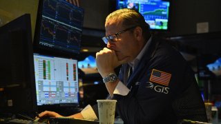 A trader works the floor at the New York Stock Exchange on Oct. 11, 2023.