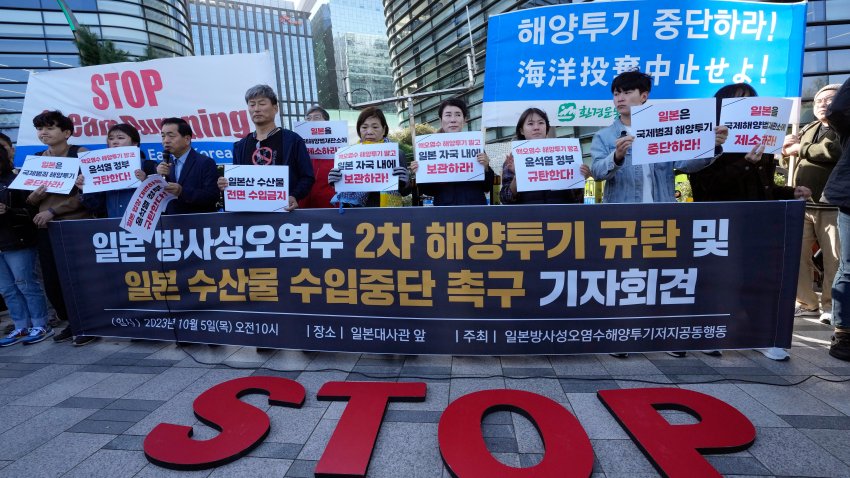 Members of civic groups stage a rally to demand the stop of the Japan’s release of treated radioactive water from the damaged Fukushima nuclear power plant into ocean, in front of a building which houses Japanese Embassy, in Seoul, South Korea, Thursday, Oct. 5, 2023.