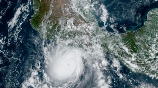 This satellite image provided by NOAA on Tuesday, Oct. 24, 2023, shows Hurricane Otis approaching  Mexico’s Pacific coast near Acapulco.