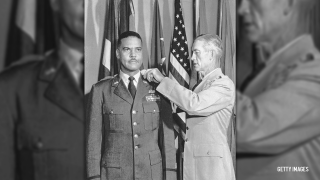 General Benjamin O. Davis, Jr. (left), is presented the stars of a brigadier general by General Earle E. Partridge. Davis, Jr. was the first Black American to attain the rank of brigadier general in the U.S. Air Force.