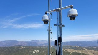 An ALERTCalifornia sensor network array that includes two cameras overlooking the landscape. These are two of the more than 1000 cameras that monitor California.