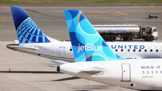 Airplanes from United and JetBlue populate the taxiway at Laguardia Airport in the Queens borough of New York City.