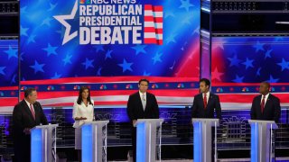 Former South Carolina Governor Nikki Haley speaks as former New Jersey Governor Chris Christie, Florida Governor Ron DeSantis, former biotech executive Vivek Ramaswamy and U.S. Senator Tim Scott (R-SC) listen at the third Republican candidates’ U.S. presidential debate of the 2024 U.S. presidential campaign hosted by NBC News at the Adrienne Arsht Center for the Performing Arts in Miami, Florida, U.S., November 8, 2023. 