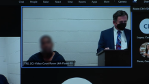 Dion Henderson, left, appears remotely in court alongside a deputy public defender. The judge allowed NBC 7 to record video of the arraignment, but ordered that Henderson's face be digitally obscured.