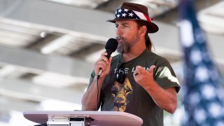 FILE - Alan Hostetter speaks during a pro-Trump election integrity rally in Santa Ana, California, Nov. 9, 2020.