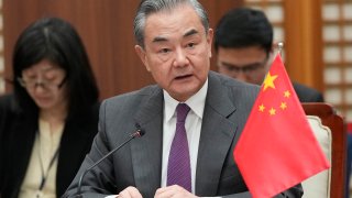 Chinese Foreign Minister Wang Yi speaks during the trilateral foreign ministers' meeting.