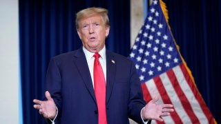 Former President Donald Trump speaks to the media at a Washington hotel, Tuesday, Jan. 9, 2024, after attending a hearing before the D.C. Circuit Court of Appeals at the federal courthouse in Washington.