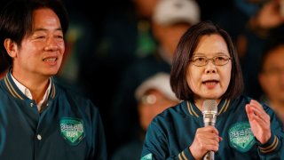 Taiwan’s President Tsai Ing-wen speaks as Lai Ching-te, Taiwan’s vice president and the ruling Democratic Progressive Party’s (DPP) presidential candidate looks on during a campaign rally ahead of the elections in Taipei, Taiwan, January 11, 2024. 