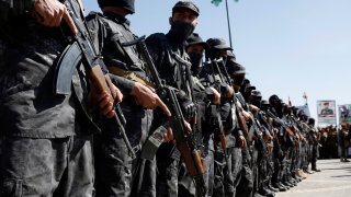 SANA’A, YEMEN – DECEMBER 03: Members of the Houthi-run Military Special Forces guard during a funeral procession of Houthi fighters at Al-Sha’ab Mosque on December 03, 2023 in Sana’a, Yemen. (Photo by Mohammed Hamoud/Getty Images)