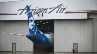 File. Alaska Airlines N704AL is seen grounded in a hangar at Portland International Airport in Portland, Oregon, on Jan. 9, 2024.