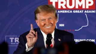 Republican presidential hopeful and former US President Donald Trump gestures as he speaks during a rally in Laconia, New Hampshire, January 22, 2024.