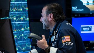 Traders work the floor during morning trading at the New York Stock exchange (NYSE) ahead of the US Federal Reserve’s decision on lending rates, in New York on January 31, 2024. 