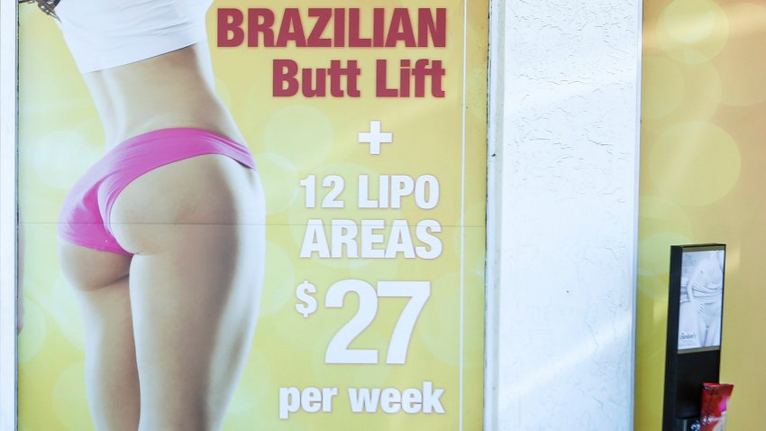 A window display advertises low-cost "Brazilian butt lift"