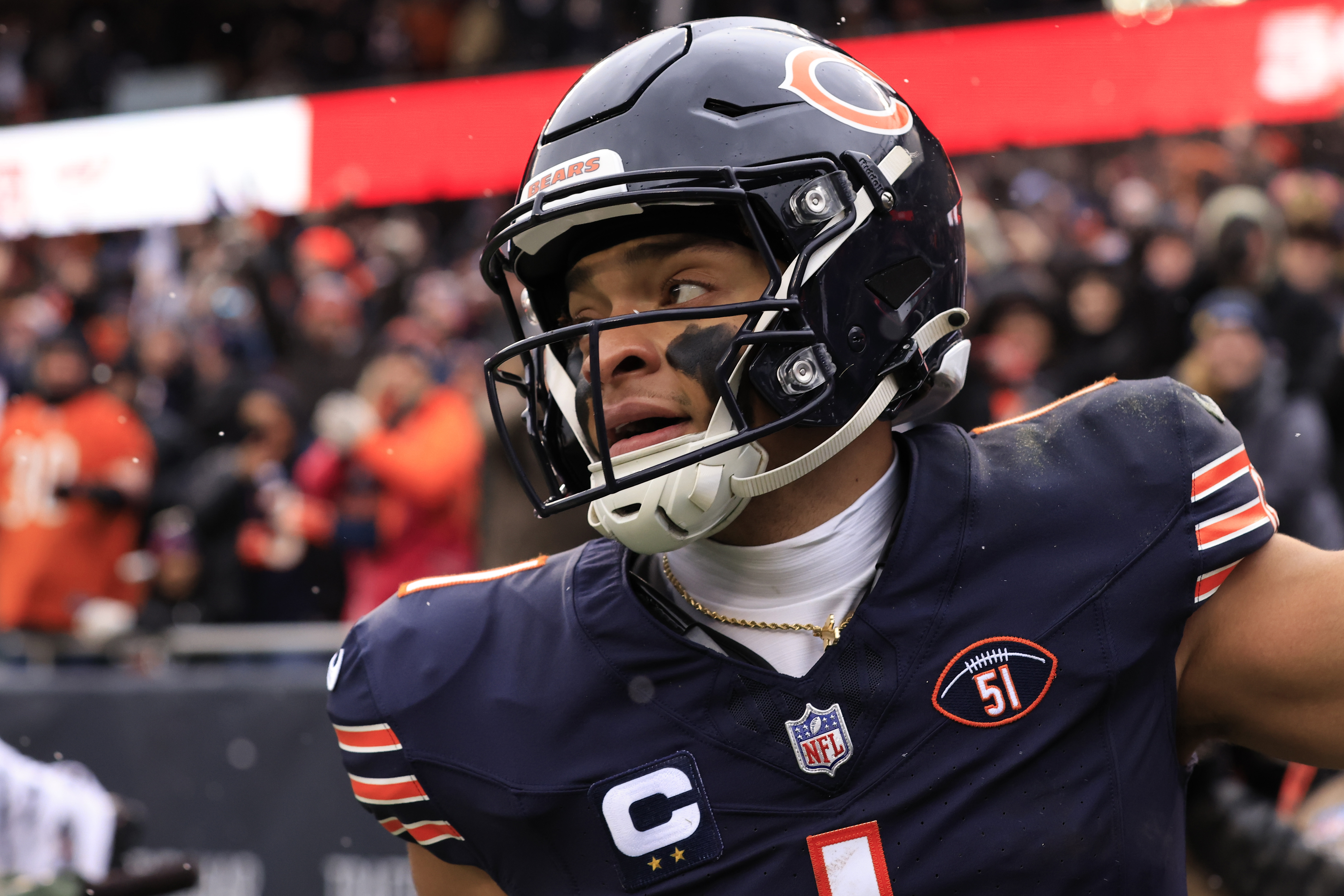 CHICAGO, ILLINOIS – DECEMBER 31: Justin Fields #1 of the Chicago Bears celebrates after a touchdown in the game against the Atlanta Falcons at Soldier Field on December 31, 2023 in Chicago, Illinois. (Photo by Justin Casterline/Getty Images)