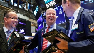 Traders work on the floor of the New York Stock Exchange.