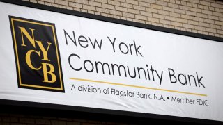 A sign is pictured above a branch of the New York Community Bank in Yonkers, New York, U.S., January 31, 2024.