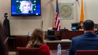 A photo of cinematographer Halyna Hutchins is displayed during the trial against Hannah Gutierrez-Reed
