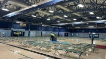 Cots are shown set up across the gym floor as part of a temporary shelter at the Balboa Park Municipal Gym at 2111 Pan American Plaza San Diego, Feb. 1, 2024.