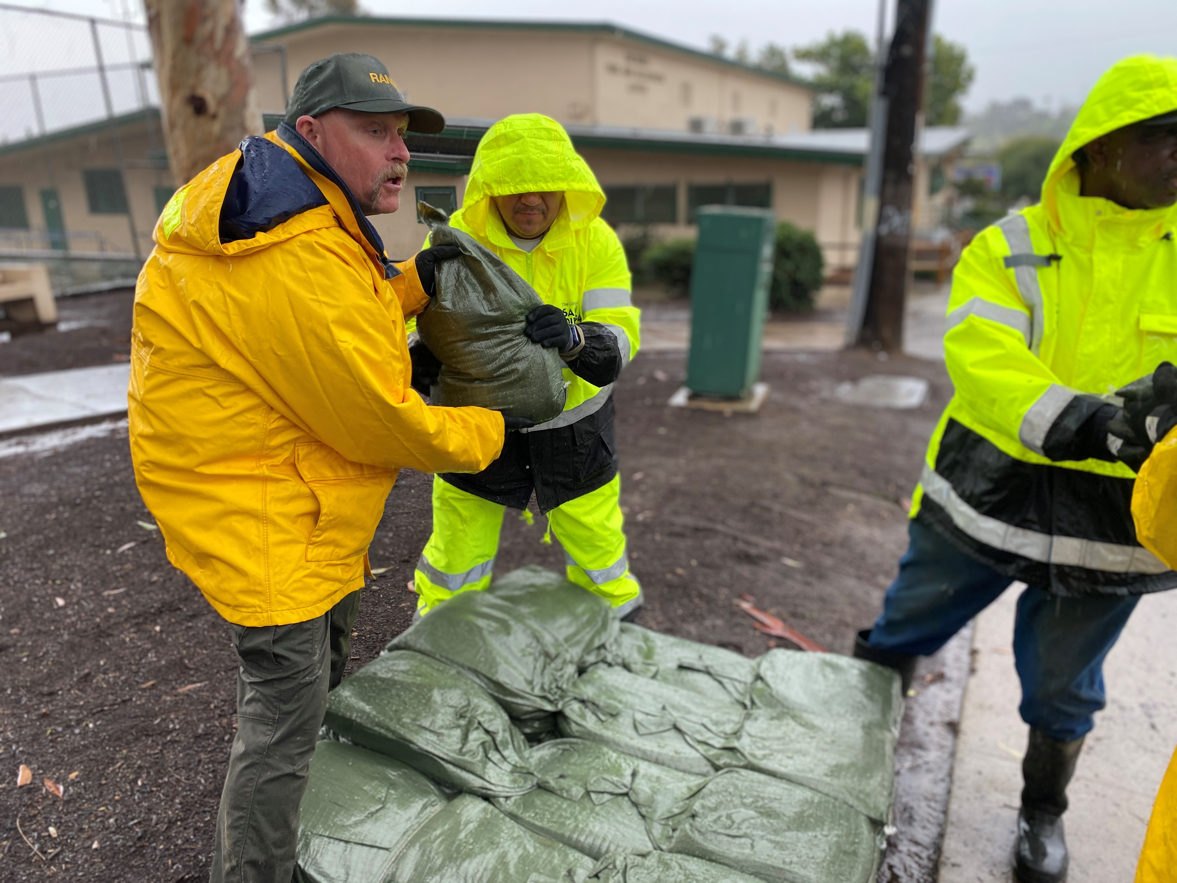 Loading sandbags in Encanto on Thursday