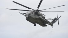 A U.S. CH-53E Super Stallion helicopter manuevers in position during training exercise with Philippine Marines September 20, 2013 in Cavite province, Philippines.