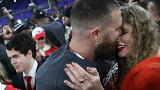 File. Travis Kelce #87 of the Kansas City Chiefs embraces Taylor Swift after a 17-10 victory against the Baltimore Ravens in the AFC Championship Game at M&T Bank Stadium on January 28, 2024 in Baltimore, Maryland.