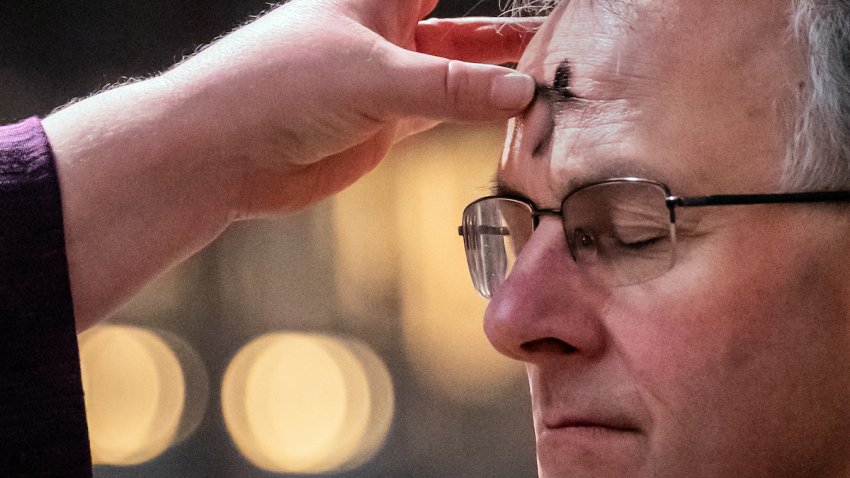 Canon Claire Renshaw makes an ash cross on the forehead of the Very Reverend John Dobson, during the imposition of the ashes during the Ash Wednesday Eucharist at Ripon Cathedral in North Yorkshire. Picture date: Wednesday February 14, 2024. (Photo by Danny Lawson/PA Images via Getty Images)