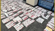 The Sacramento County Sheriff's Office says this photo depicts more than 5,000 gift cards they found in the possession of one man, Ningning Sun, who they arrested at a Sacramento Target after seeing him placing gift cards on the rack. Sun is now facing various charges, including fraud.  Photo Courtesy: Sacramento County Sheriff's Office.