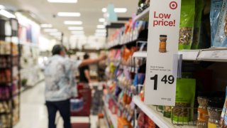 A customer shops at a supermarket in Oregon.