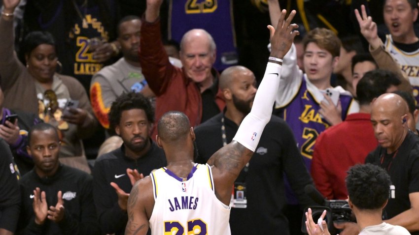 LeBron James salutes the crowd