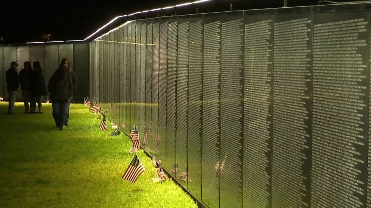 Candlelight vigil honors Vietnam War veterans at ‘The Wall That Heals