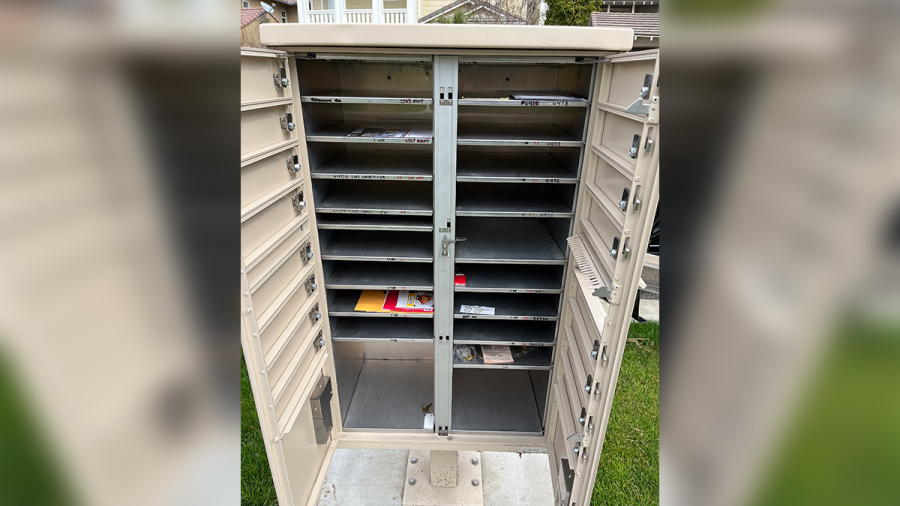 A Bressi Ranch homeowner shot this photo, showing most of a cluster mailbox cleaned out by a suspected thief after a USPS delivery in February.