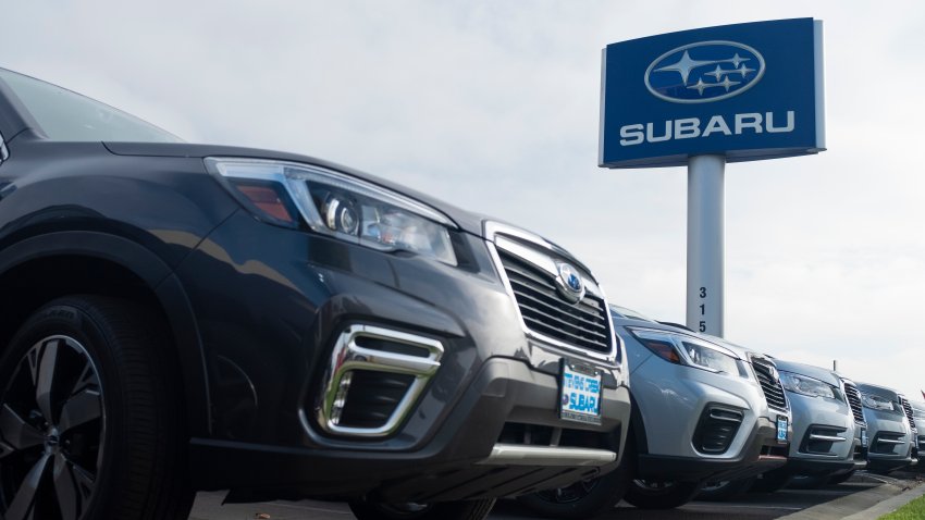 Line of Subaru cars at dealership