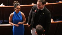 (L-R) US Representative Lauren Boebert (R-CO) talks with Rep. George Santos (R-NY) ahead of US President Joe Biden's State of the Union address in the House Chamber of the US Capitol in Washington, DC, on March 7, 2024. (Photo by Mandel NGAN / AFP) (Photo by MANDEL NGAN/AFP via Getty Images)