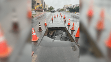 A section of the road collapsed in Little Italy on March 30, 2024. (Image courtesy of the City of San Diego via X)